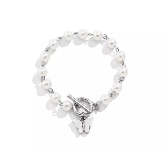 butterfly bracelet , white background , top view