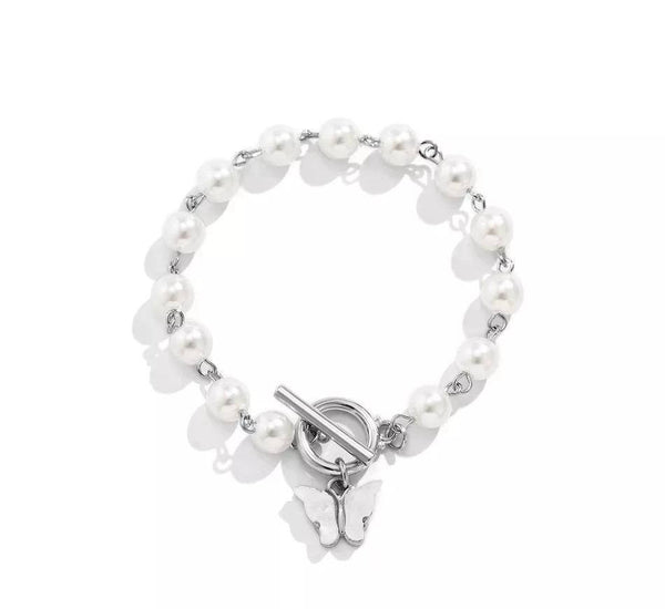 butterfly bracelet , white background , top view