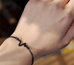 black heart beat bracelet , on hand