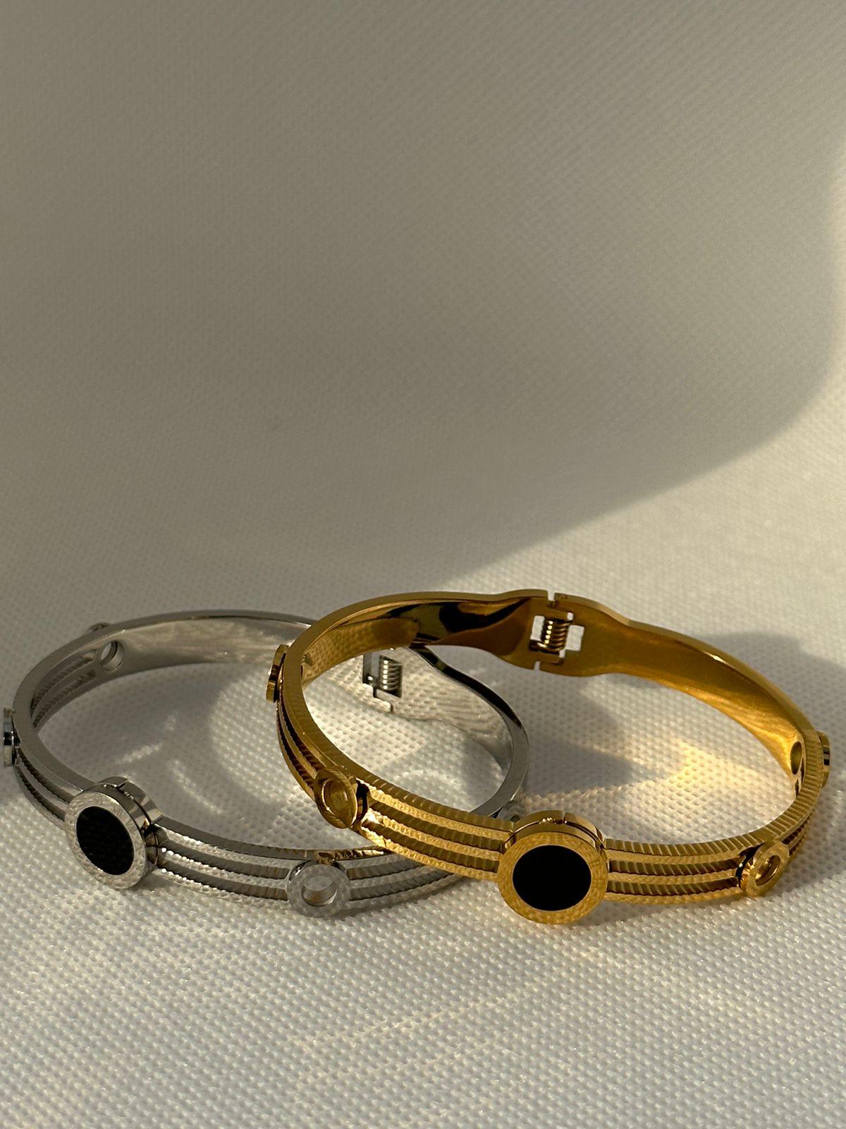 silver -gold stone bracelet , bottom side